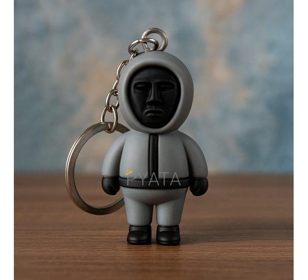 Колекційні брелоки моделька охоронця Гра в кальмара "Ведучий" 58х30 мм (12) Колекційні брелоки моделька охоронця Гра в кальмара "Ведучий" 58х30 мм (12)