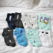 Набір демісезонних дитячих шкарпеток 12 шт 26-35 розмір текстиль випадкові кольори Набір демісезонних дитячих шкарпеток 12 шт 26-35 розмір текстиль випадкові кольори